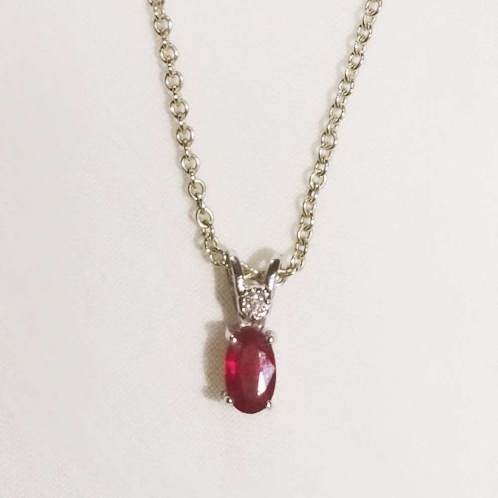 Ruby and diamond pendant necklace